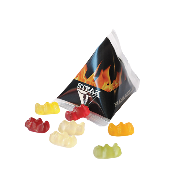Driehoekig zakje gevuld met fruitgummetjes
